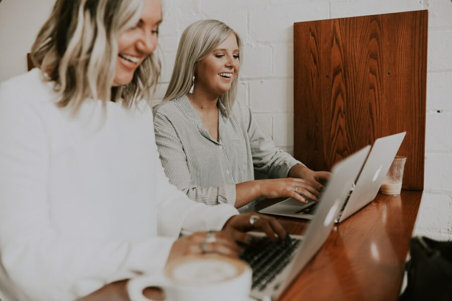 two employees working at a desk